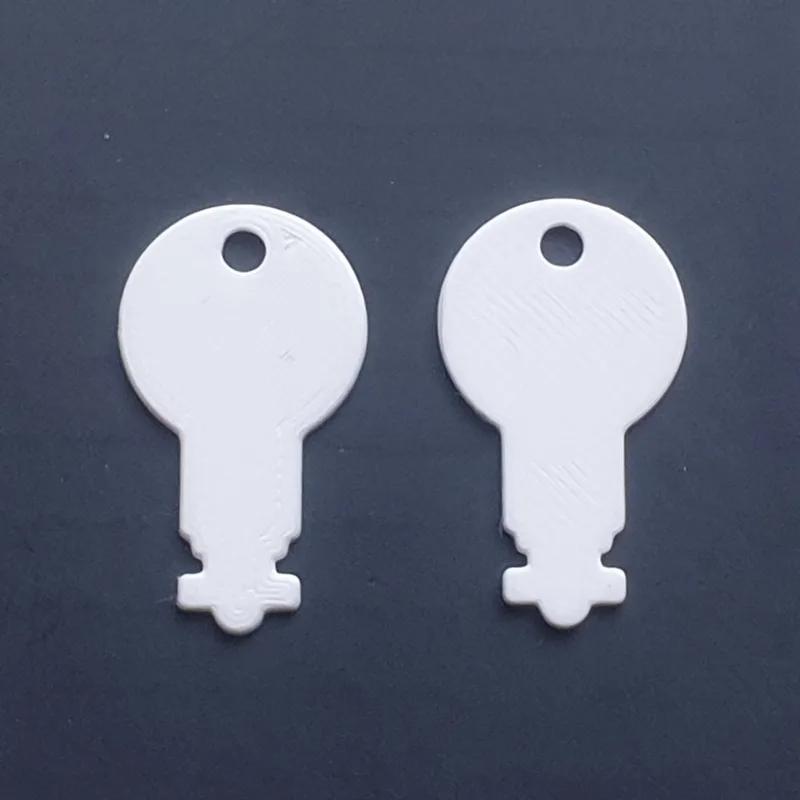 unbranded towel and soap dispenser key - K2C614