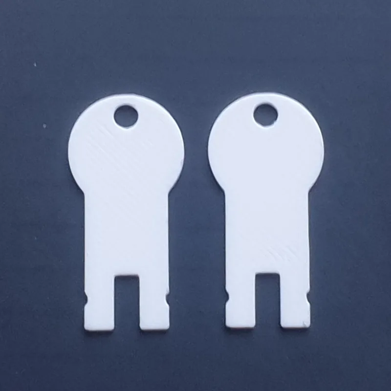 unbranded towel and soap dispenser key - K2C616