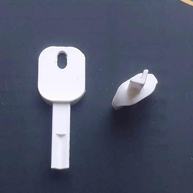 unbranded towel and soap dispenser key - K2C618